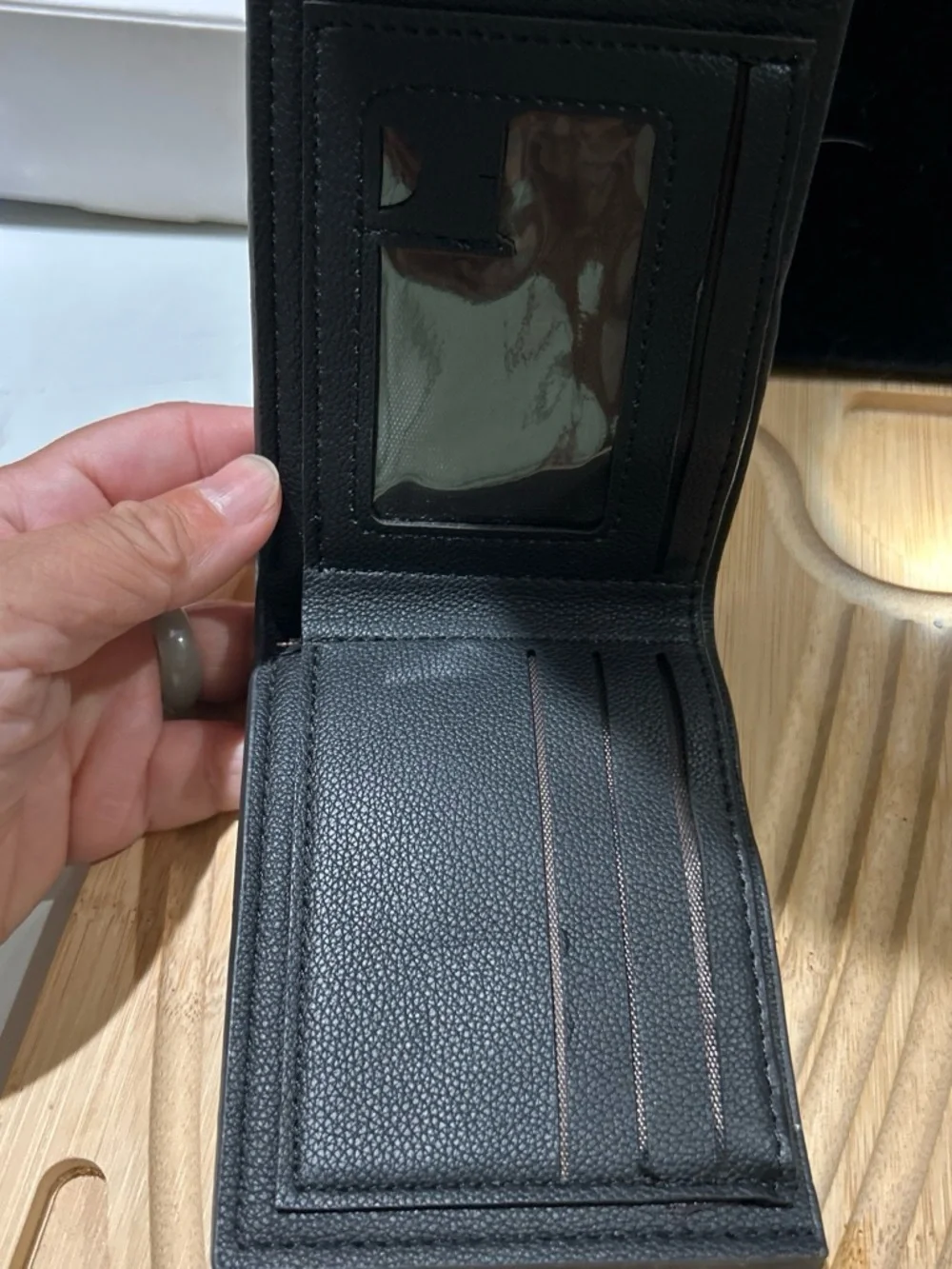 Black Leather Men’s Wallet have some wrinkle in the top